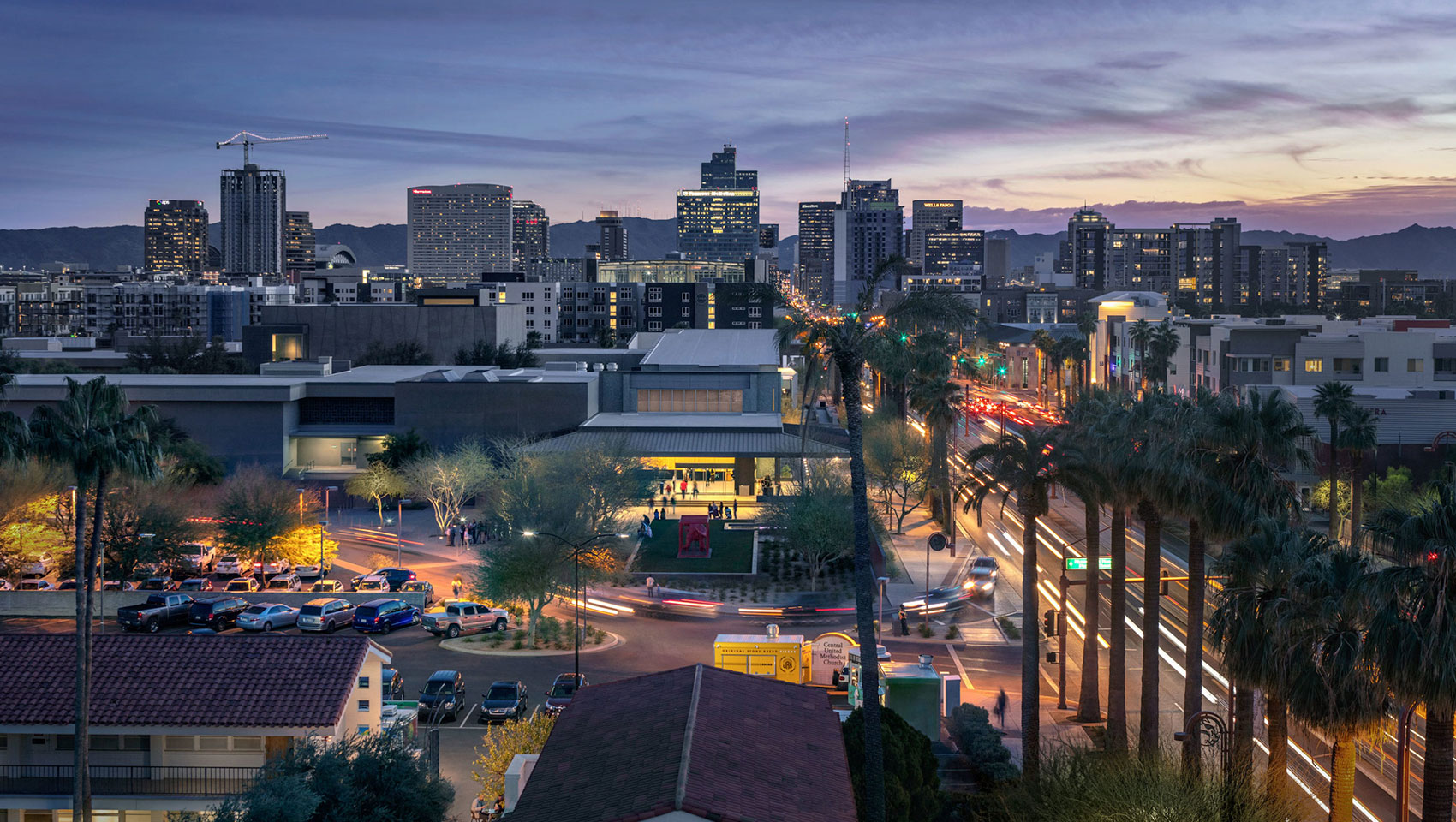 a city with cars and buildings