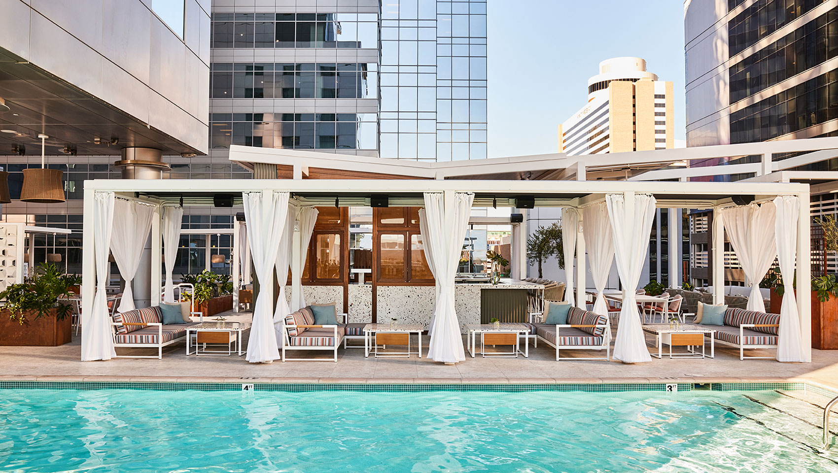 pool with cabanas