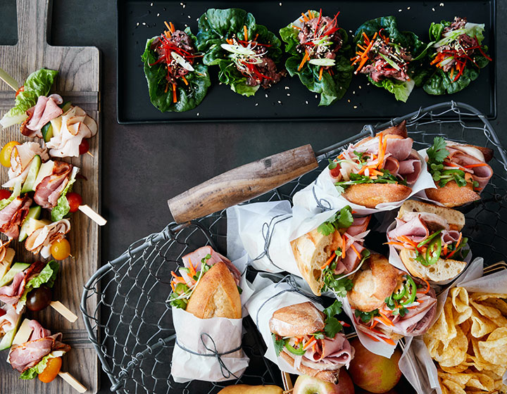 lunch break set up with assorted sandwiches and snacks