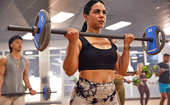 Woman lifting bar bell