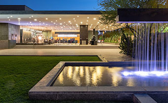 a fountain in front of a building